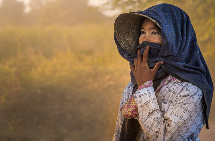 a Burmese farmer in the afternoon sun near her village of Bagan Myanmar