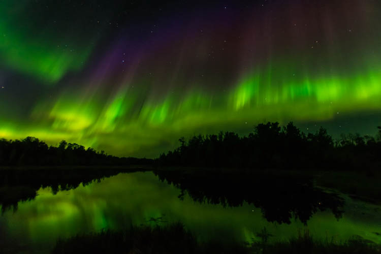 The northern lights and Canadian landscape