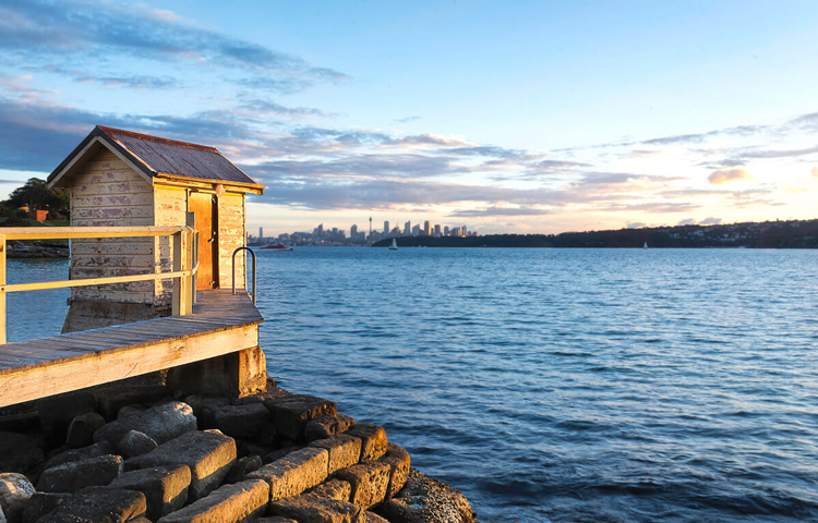 Same photo of dock on lake but with horizon straightened in processing
