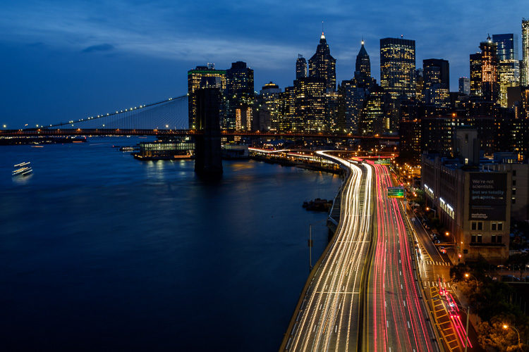 Night photo of New York during blue hour showing car light trails. Didn't have to pack extra equipment
