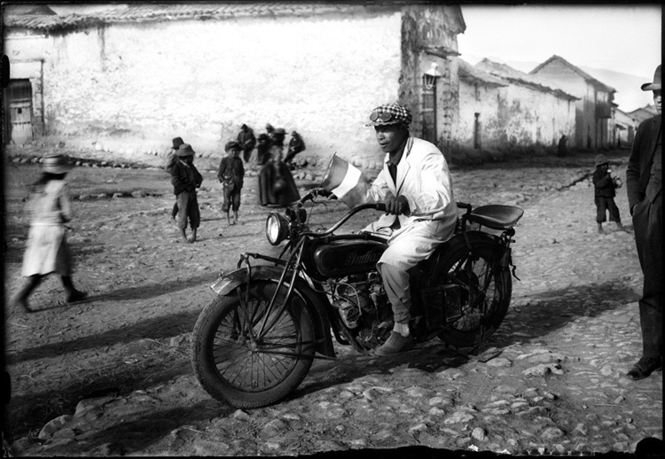 old photo of man on a motorcycle in Cuzco Peru by Martin Chambi