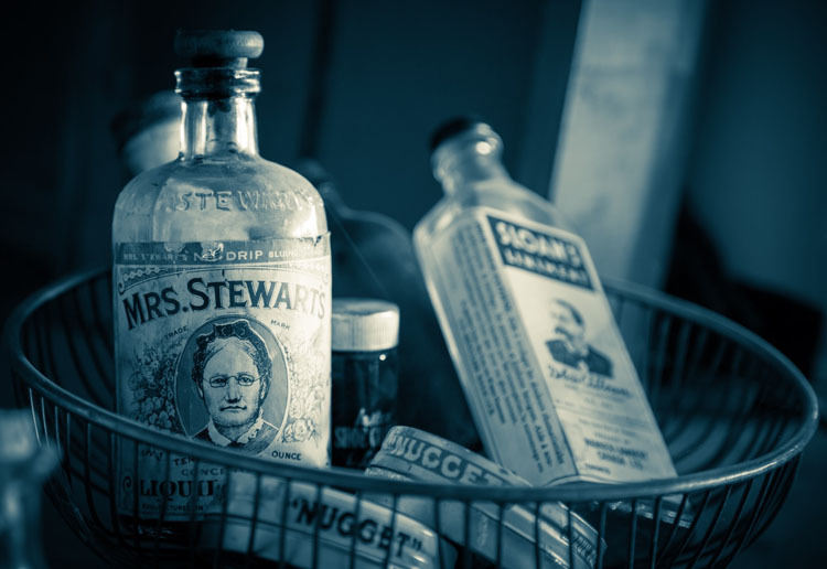 antique bottles with duotone applied using Luminar