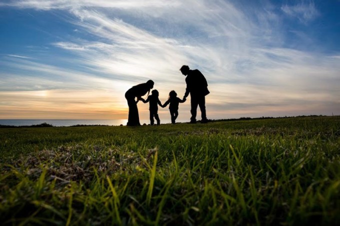 family in silhouette