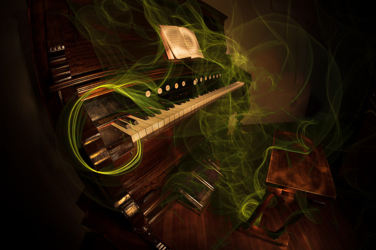 An organ in an old church at night with some light painting becomes a spooky subject.