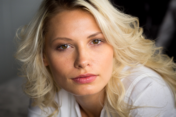 Cropped into the head, but shoulders left in as a base is more pleasing to the eye - feels better.