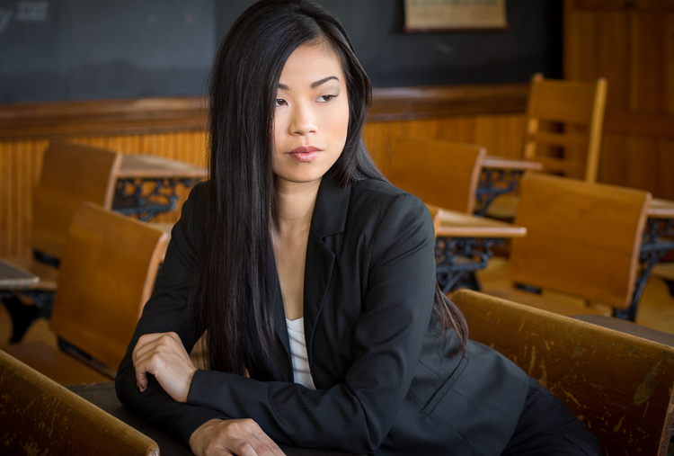 If you are going to crop into the head make it obvious, not like this. Also make sure you crop mid-arm or have all their fingers. No amputations.