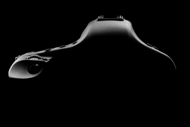 Silhouette of a black digital camera