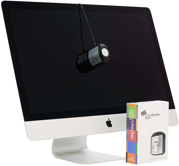 photo showing how the monitor calibration hardware hangs in front of the monitor