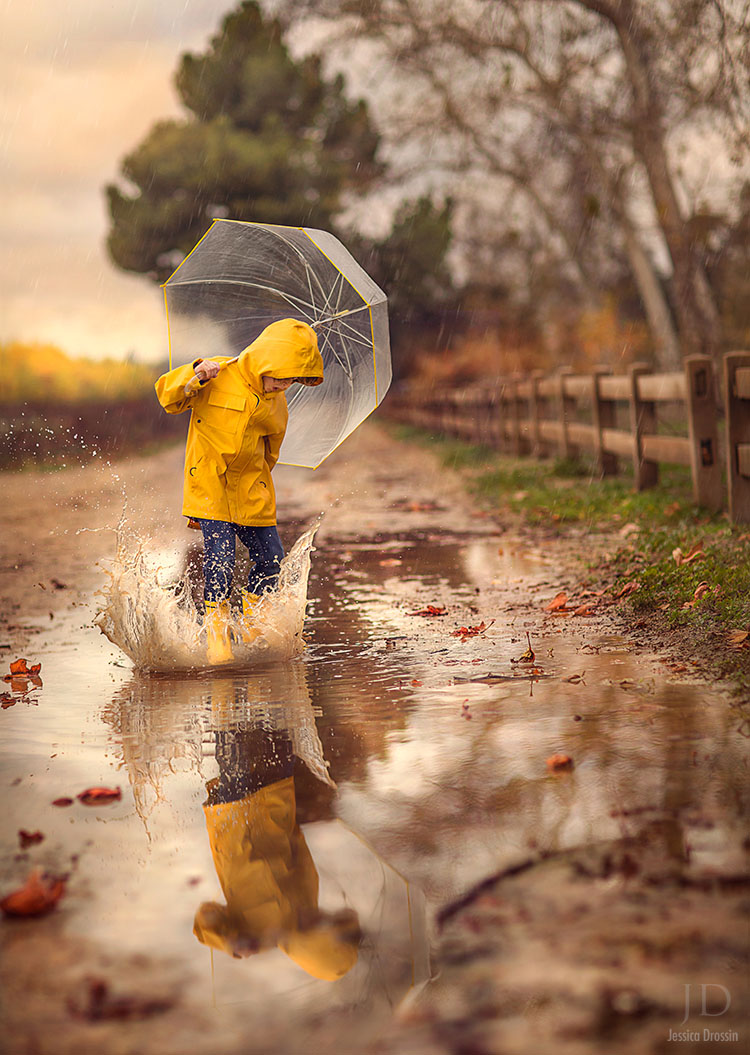 rainy day photo opportunity.  Photography of your kid in a raincoat splashing in a puddle