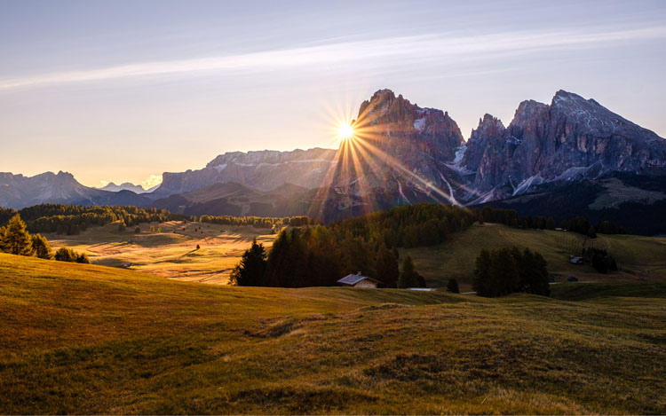 Sunrise over Sassolungo Alpe Siusi mountains in Italy