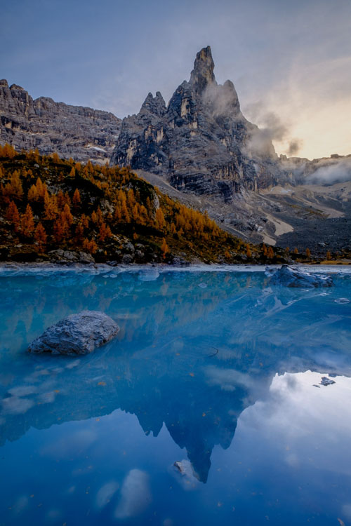 Mountain photography tip: Use vertical orientation to capture the height of a mountain peak or reflection below