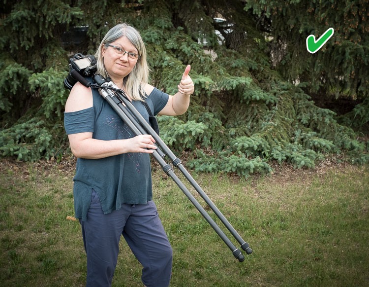 how to carry your camera tripod correctly.