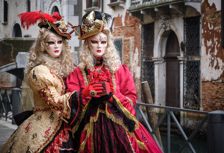 two characters in Carnival costumes