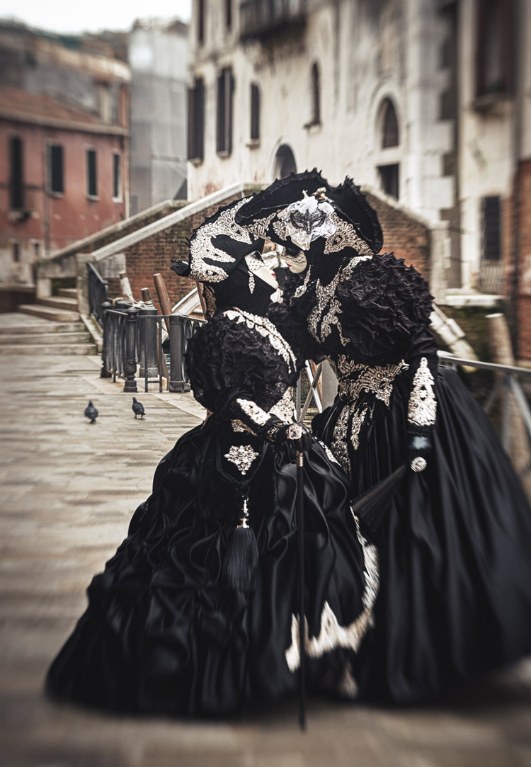 Lensbaby lens used on these two Carnival characters along with a color LUT texture overlay edited in with Luminar 4 for a creative effect