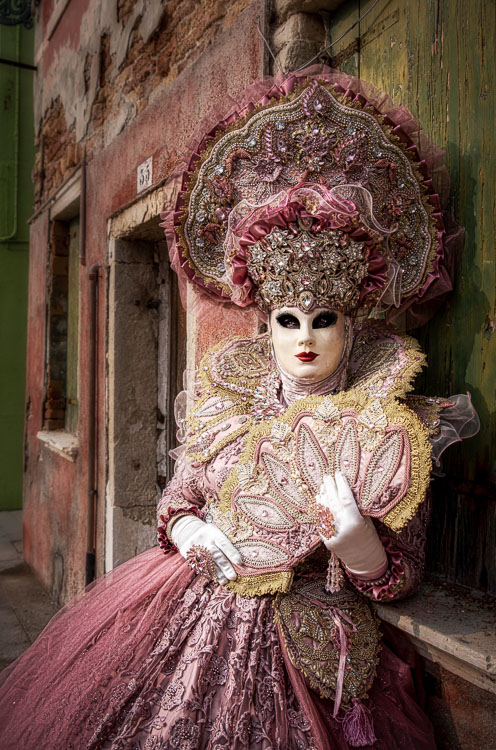 Lady in costume and mask at Venice carnival festival