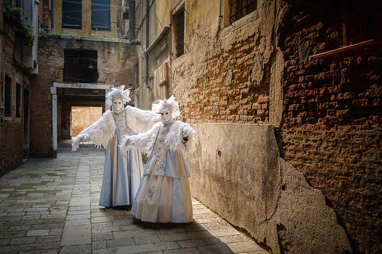 bird characters pose in the courtyard