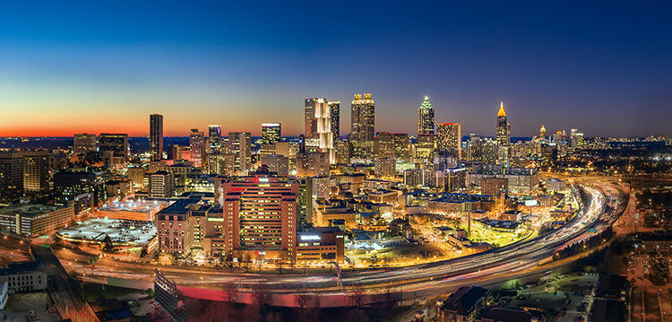 Atlanta skyline at night with light trails, exposed at 1/5 second, f/2.8, ISO 400.